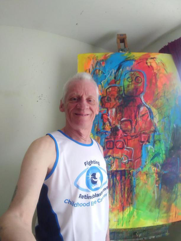 Daniel Pincham-Phipps with his artwork in support of Childhood Eye Cancer Trust